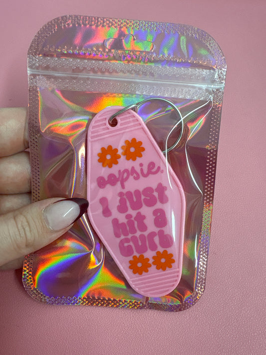 Oopsie I just hit a curb keychain💗