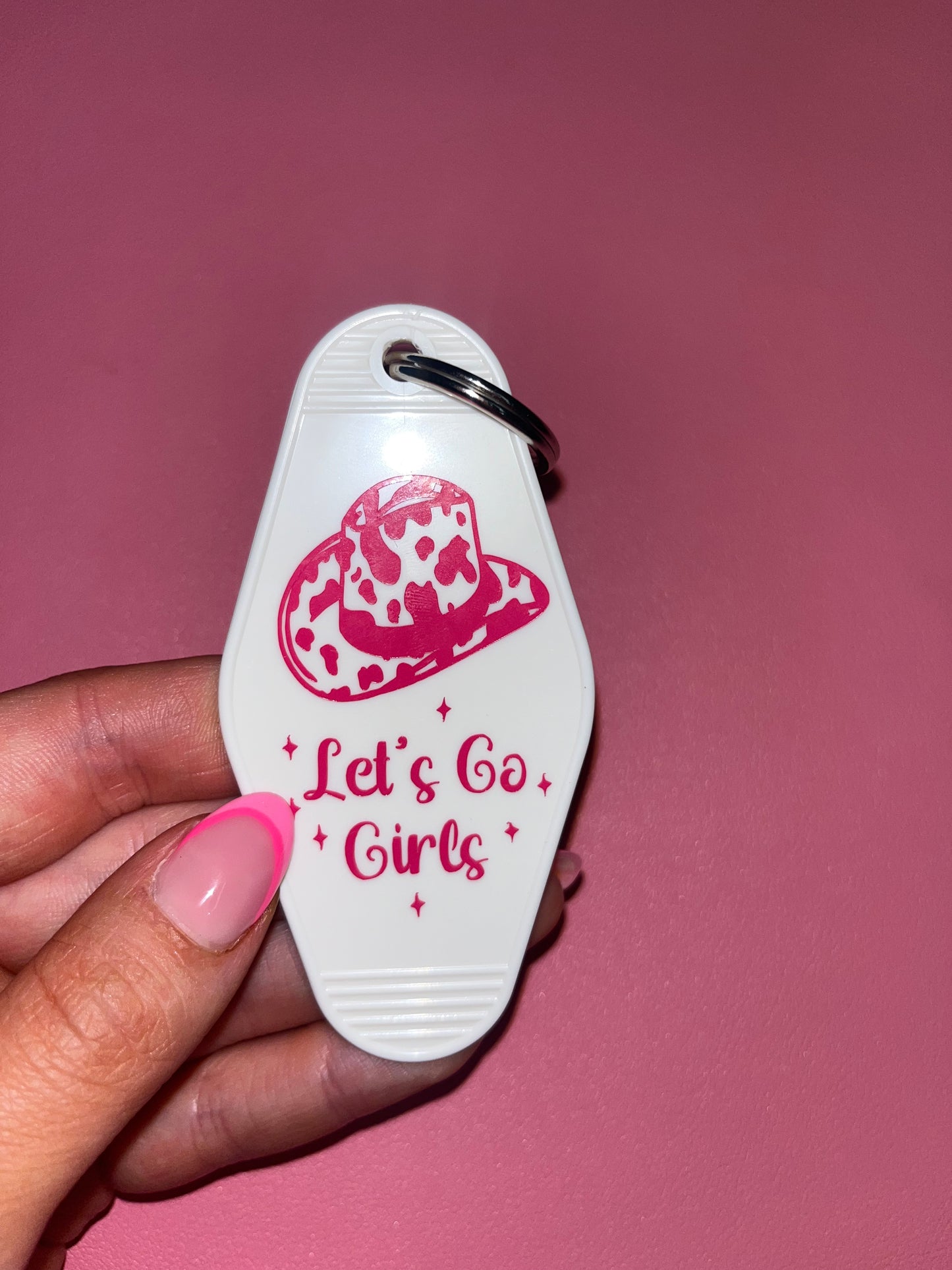 Let’s go girls motel keychain🤠