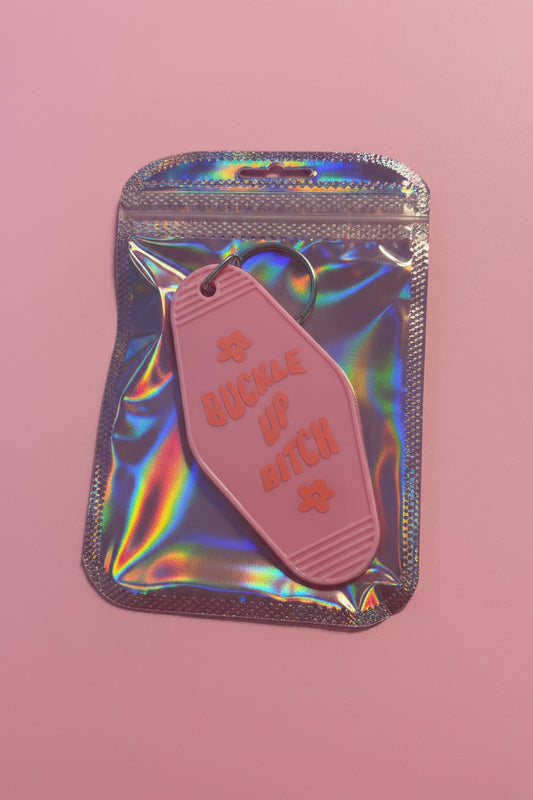 Buckle up bitch motel keychain🍑